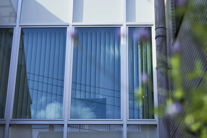 Large windows with greenery